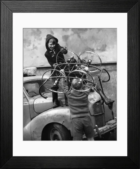 Framed Print : Boys with pram wheels and car in Balham street, SW London Framed Print : Boys with pram wheels and car in Balham street, SW London
