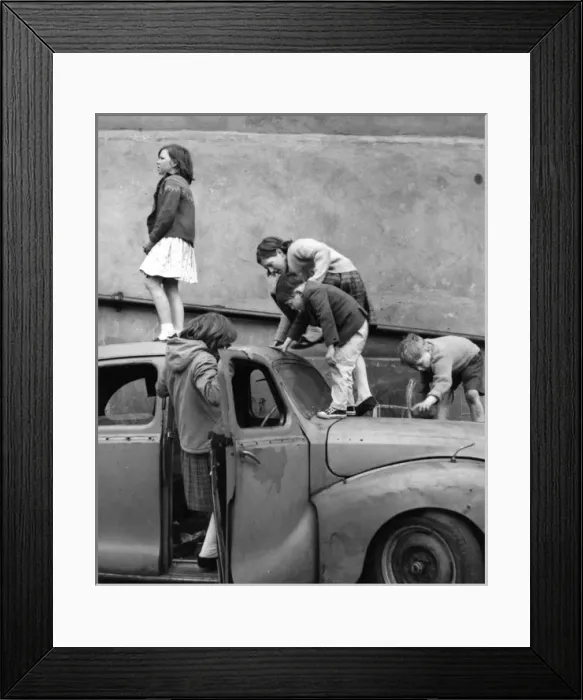 Framed Print : Children playing with a car in a Balham street, SW London Framed Print : Children playing with a car in a Balham street, SW London