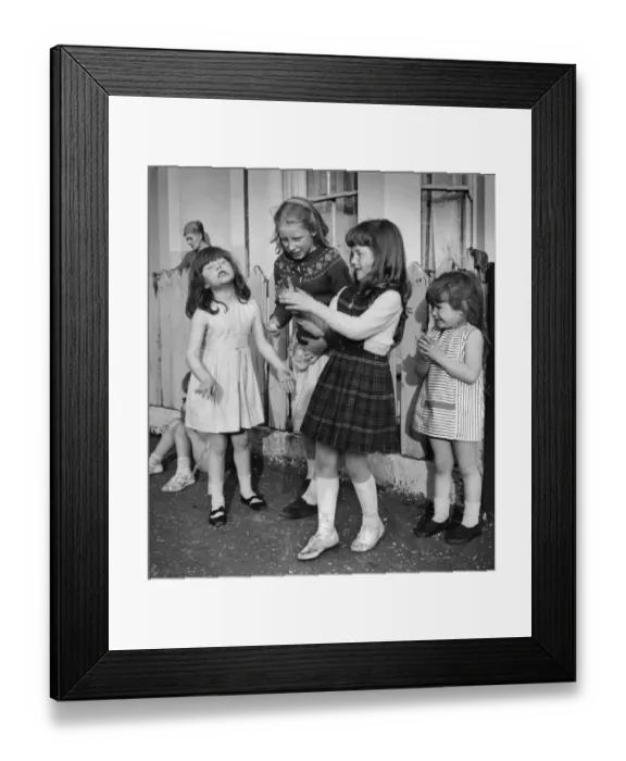 Framed Print : Group of girls on a Balham street, SW London Framed Print : Group of girls on a Balham street, SW London
