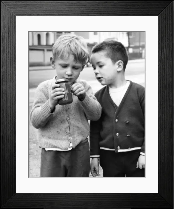 Framed Print : Two boys with jam jar on a Balham street, SW London