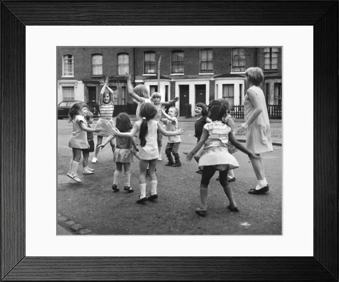 Framed Print : Group of children playing on a Balham street, SW London Framed Print : Group of children playing on a Balham street, SW London