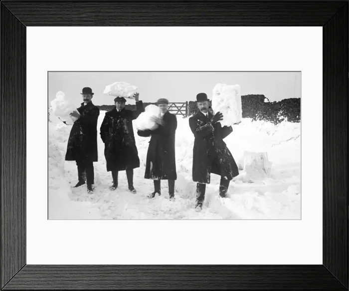 Framed Print : Group of men holding snow Framed Print : Group of men holding snow