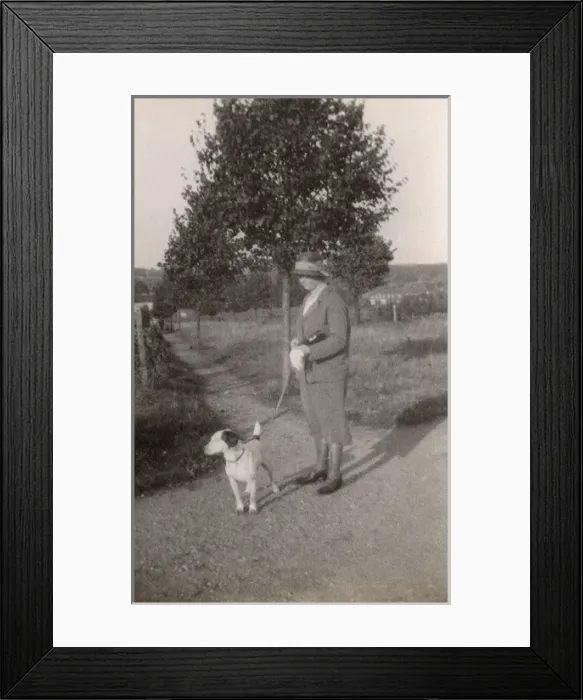 Framed Print : Woman with dog in the park Framed Print : Woman with dog in the park