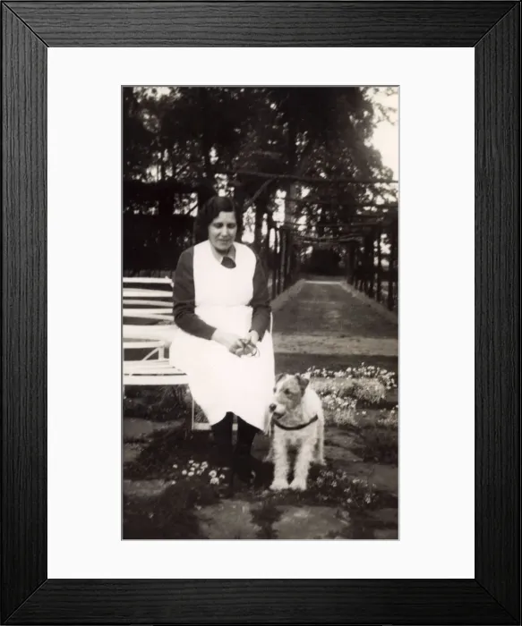 Framed Print : Woman with Terrier in the park