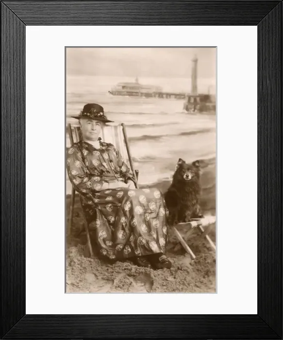 Framed Print : Woman with Pomeranian on the beach Framed Print : Woman with Pomeranian on the beach