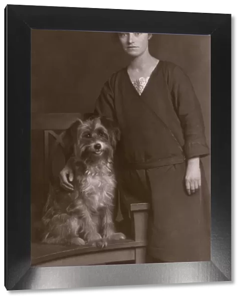 Woman with hairy dog