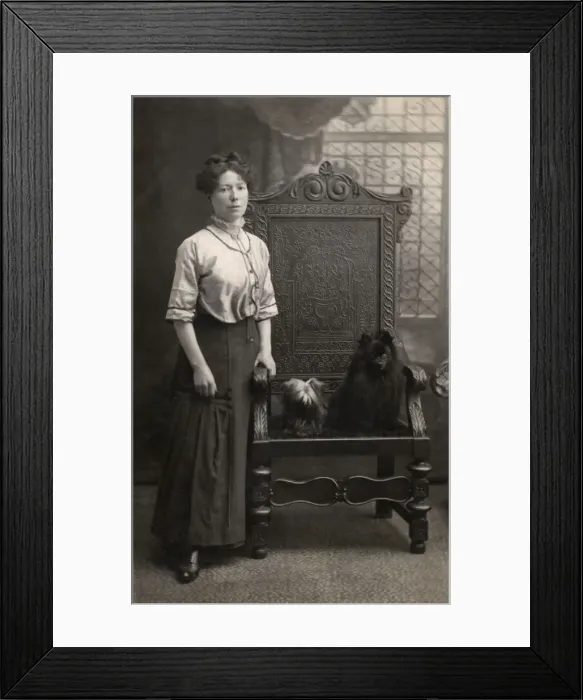 Framed Print : Woman with two hairy dogs