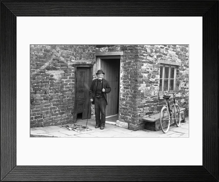 Framed Print : Old man outside house Framed Print : Old man outside house