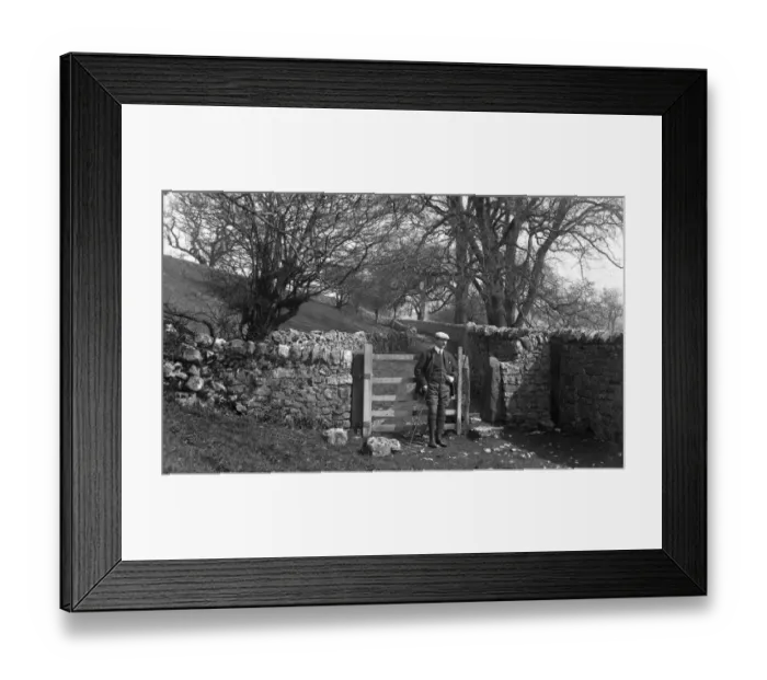 Framed Print : Edwardian man at gateway in countryside Framed Print : Edwardian man at gateway in countryside