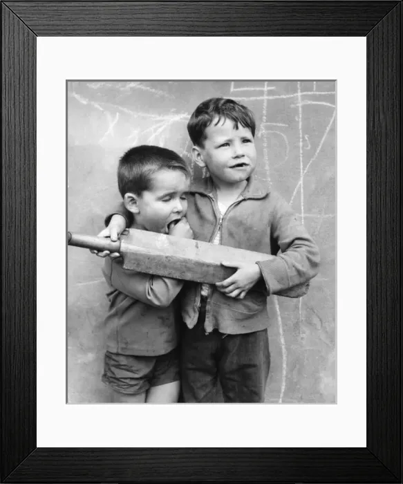 Framed Print : Two boys with cricket bat on a Balham street, SW London Framed Print : Two boys with cricket bat on a Balham street, SW London