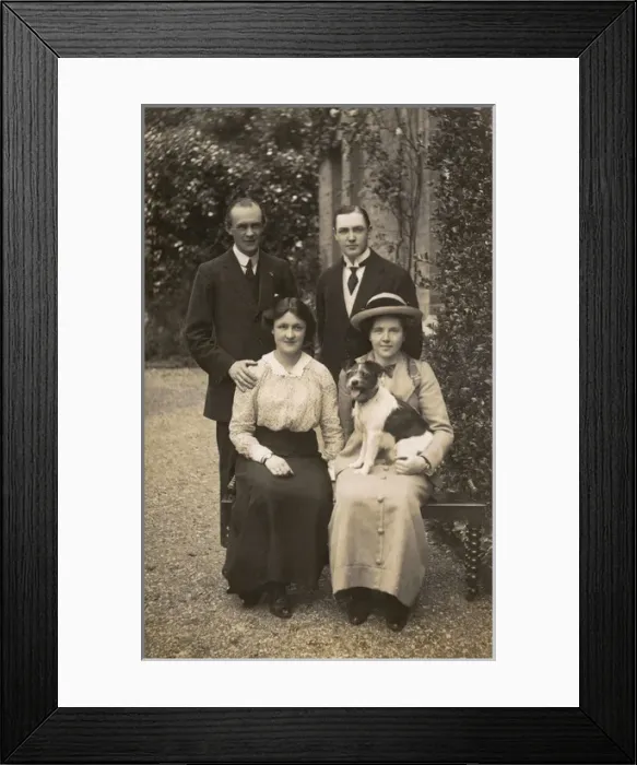 Framed Print : Two men, two women and dog in garden Framed Print : Two men, two women and dog in garden