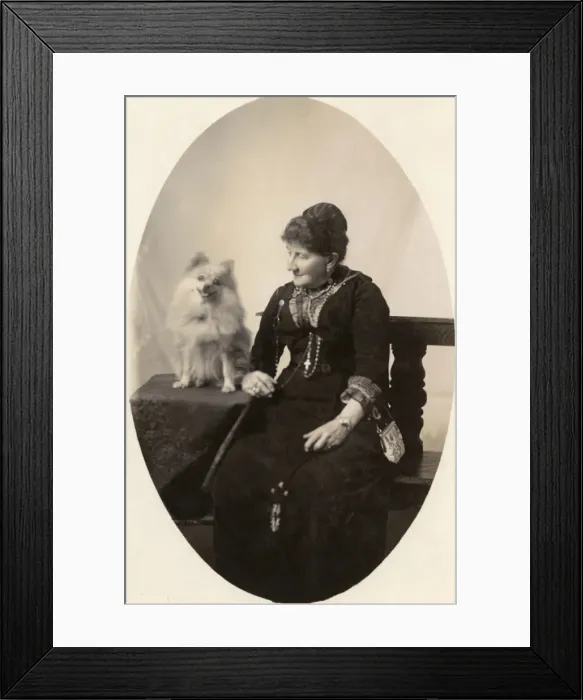 Framed Print : Middle aged woman with dog in studio photo Framed Print : Middle aged woman with dog in studio photo