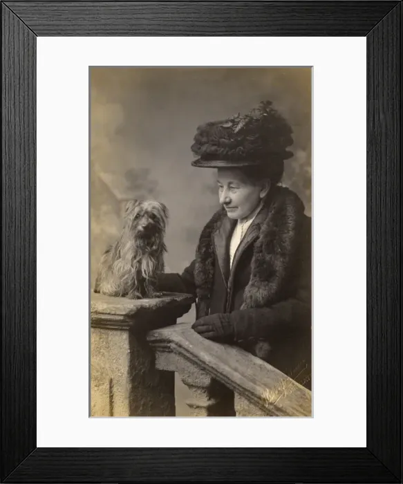 Framed Print : Middle aged woman with dog in studio photo Framed Print : Middle aged woman with dog in studio photo