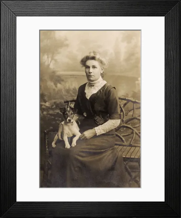Framed Print : Young woman with dog in studio photo Framed Print : Young woman with dog in studio photo