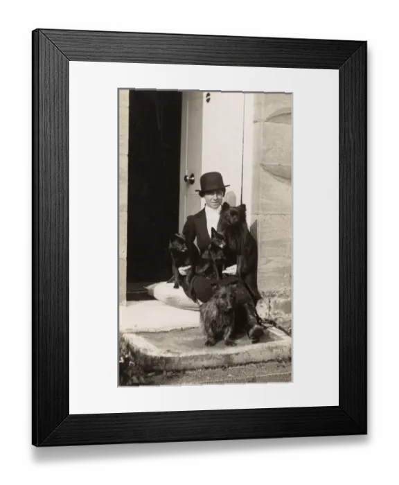 Framed Print : Woman and dogs on a doorstep Framed Print : Woman and dogs on a doorstep