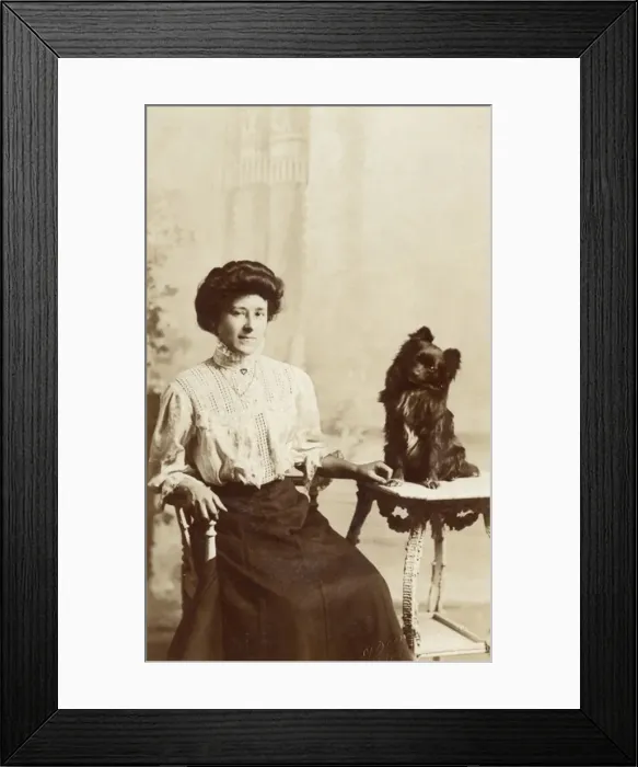 Framed Print : Young woman with dog in studio photo Framed Print : Young woman with dog in studio photo