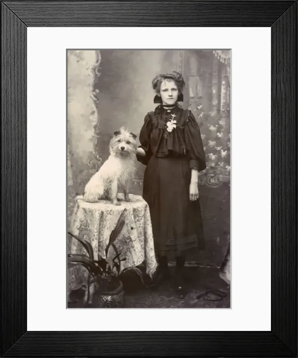 Framed Print : Young woman with dog in studio photo Framed Print : Young woman with dog in studio photo