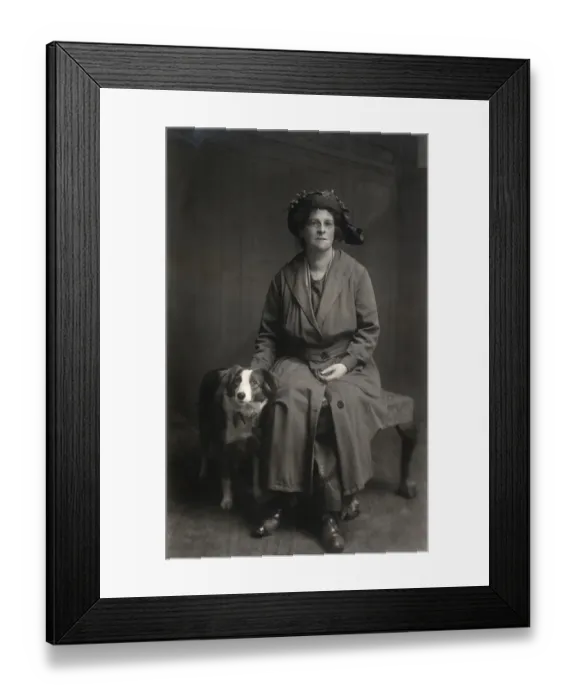 Framed Print : Woman with dog in studio photo Framed Print : Woman with dog in studio photo