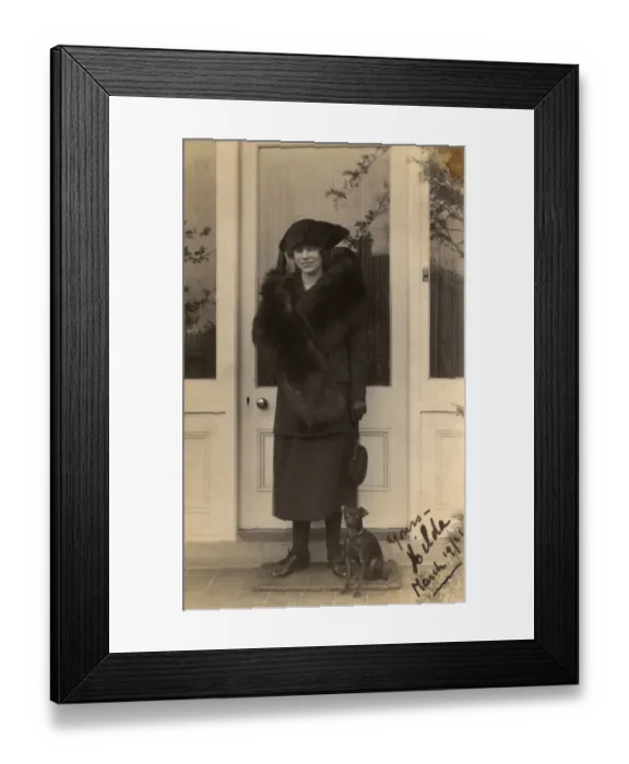 Framed Print : Woman and dog on a doorstep Framed Print : Woman and dog on a doorstep