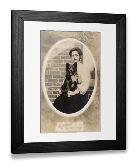 Framed Print : Woman with dog on her lap Framed Print : Woman with dog on her lap