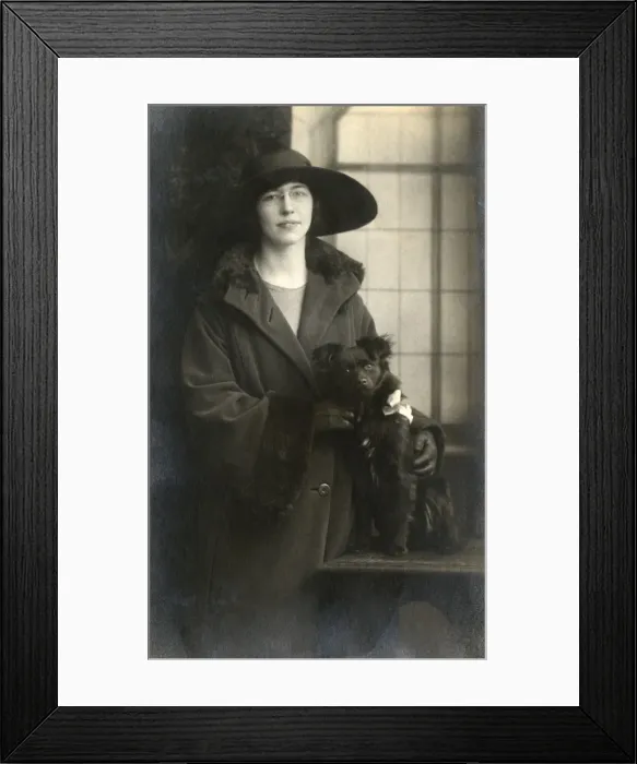 Framed Print : Woman with small dog Framed Print : Woman with small dog