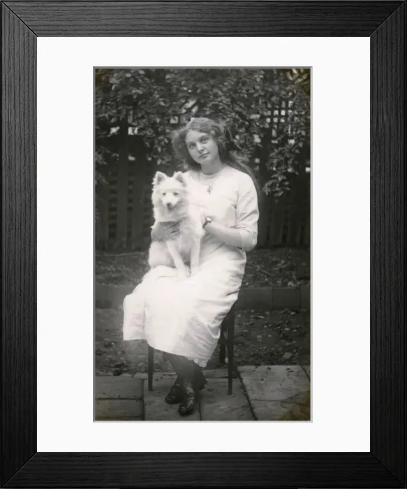 Framed Print : Woman and her Eskimo dog Framed Print : Woman and her Eskimo dog