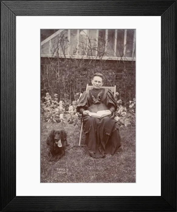 Framed Print : Woman with Flat-Coated Retriever Framed Print : Woman with Flat-Coated Retriever