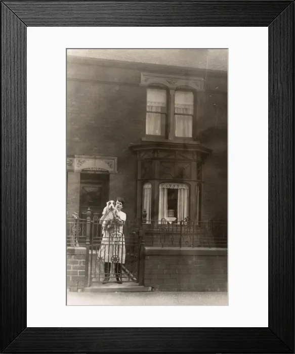Framed Print : Woman with puppy Framed Print : Woman with puppy