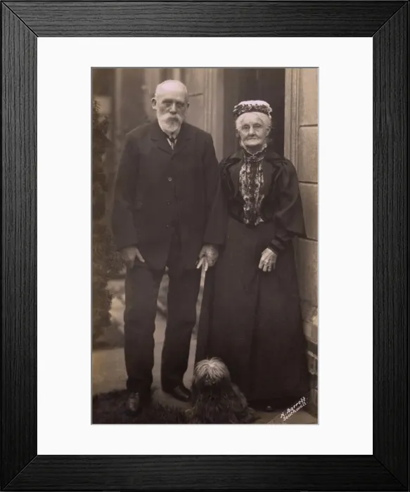 Framed Print : Old couple with Havanese Framed Print : Old couple with Havanese
