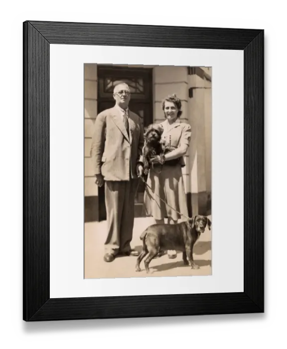 Framed Print : Couple with two dogs Framed Print : Couple with two dogs