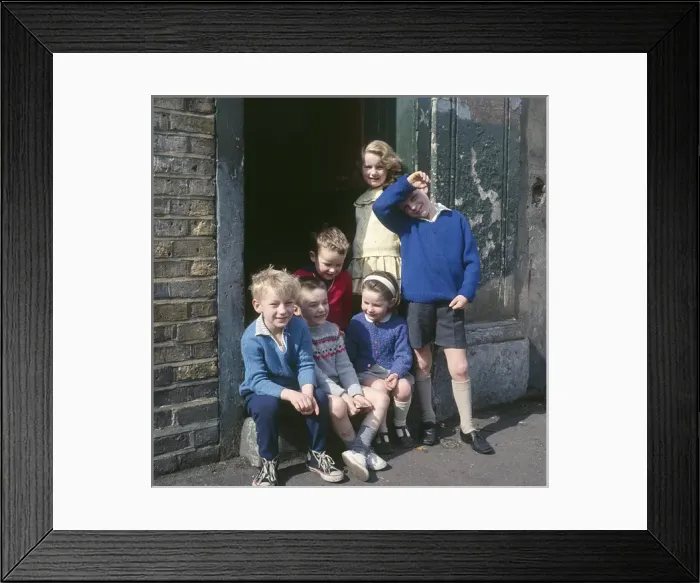 Framed Print : Children in doorway of a Balham street, SW London Framed Print : Children in doorway of a Balham street, SW London
