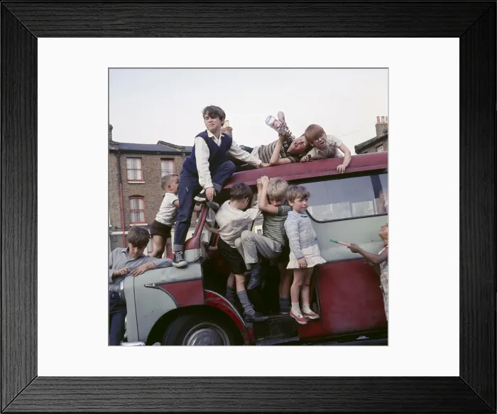 Framed Print : Children playing with a van in a Balham street, SW London Framed Print : Children playing with a van in a Balham street, SW London