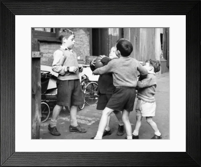 Framed Print : Boys playing football in a street, Balham, SW London Framed Print : Boys playing football in a street, Balham, SW London