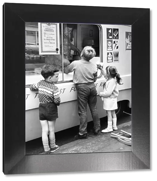 Children buying ice cream on a Balham street, SW London