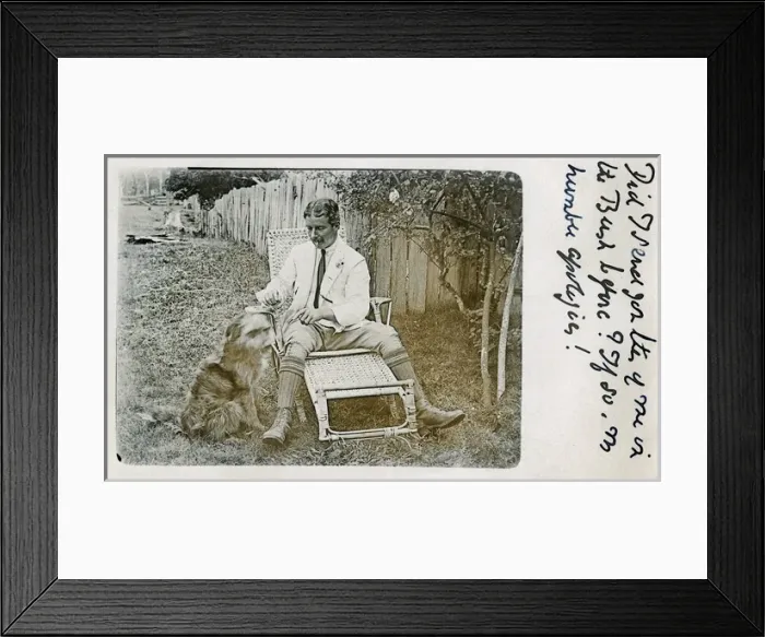 Framed Print : Man in garden chair with pet dog Framed Print : Man in garden chair with pet dog
