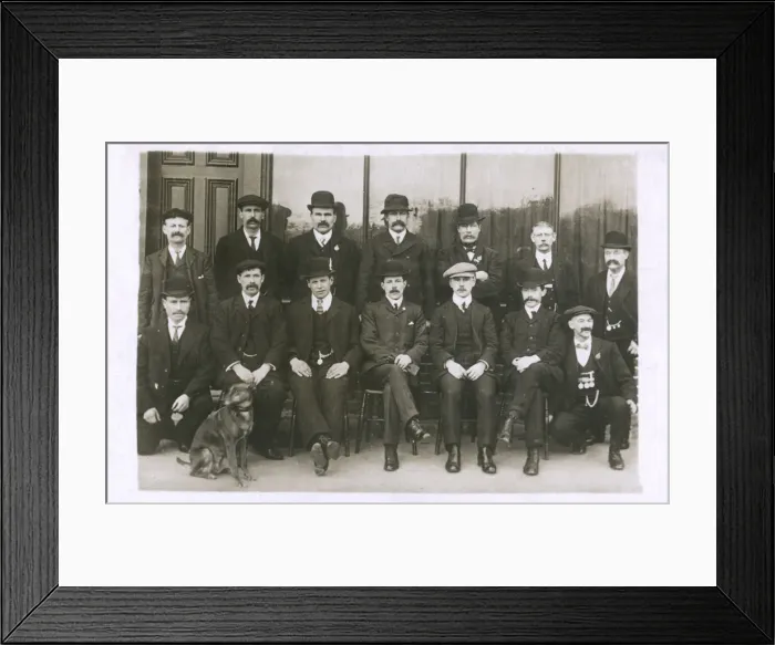 Framed Print : Group photo of men with a dog Framed Print : Group photo of men with a dog