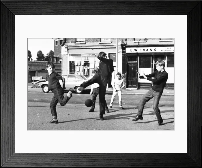 Framed Print : Boys playing football in a street, Balham, SW London Framed Print : Boys playing football in a street, Balham, SW London