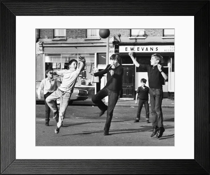 Framed Print : Boys playing football in a street, Balham, SW London Framed Print : Boys playing football in a street, Balham, SW London
