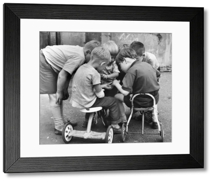Framed Print : Boys with tricycles in a Balham street, SW London Framed Print : Boys with tricycles in a Balham street, SW London