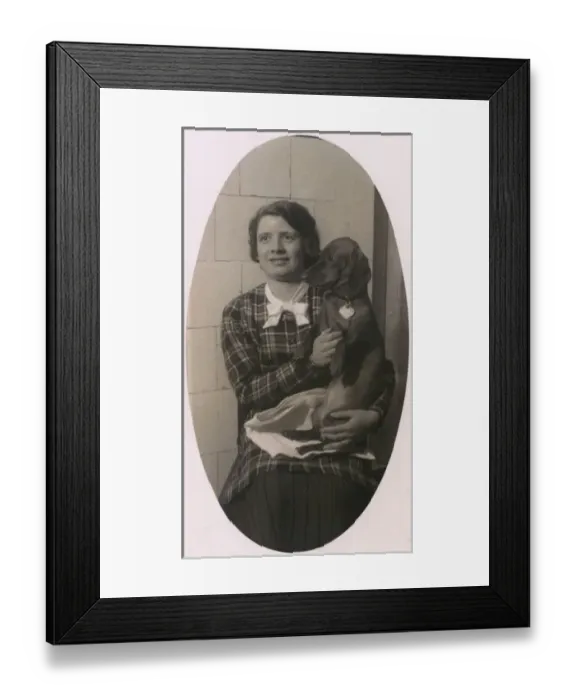 Framed Print : Woman with a dachshund on her lap Framed Print : Woman with a dachshund on her lap