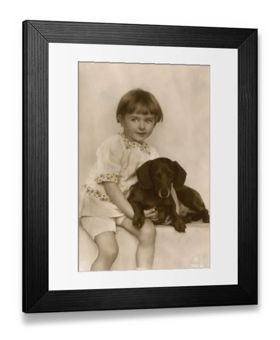 Framed Print : Studio portrait, little child with dachshund Framed Print : Studio portrait, little child with dachshund