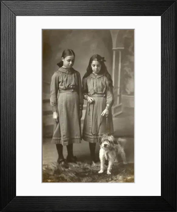 Framed Print : Studio portrait, two girls with terrier dog Framed Print : Studio portrait, two girls with terrier dog