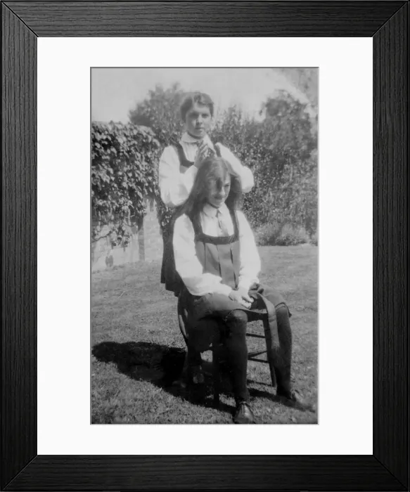Framed Print : Student with hair undone in garden Framed Print : Student with hair undone in garden