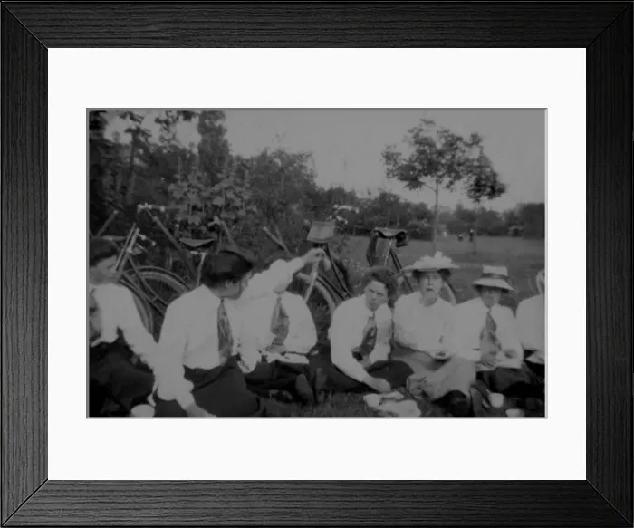 Framed Print : Students with bicycles having a picnic Framed Print : Students with bicycles having a picnic