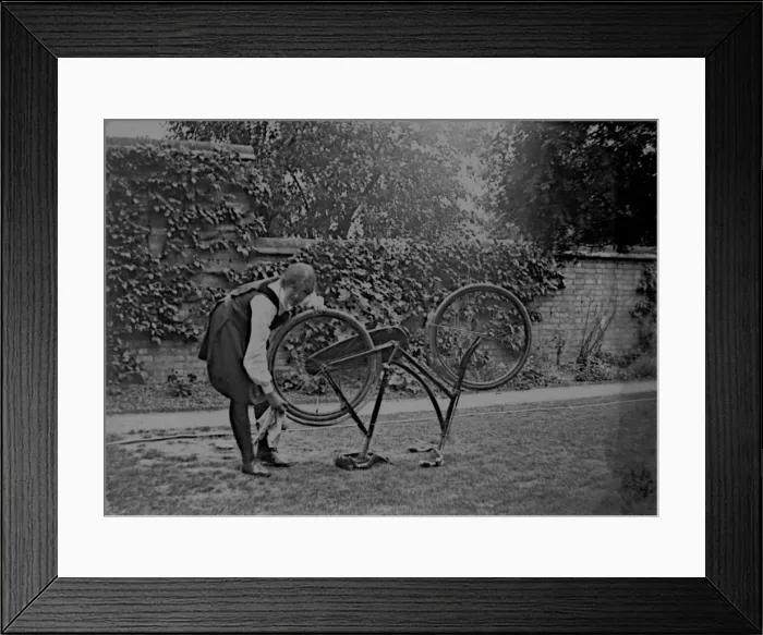 Framed Print : Student cleaning bicycle Framed Print : Student cleaning bicycle
