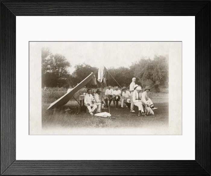 Framed Print : Men camping with two terrier dogs Framed Print : Men camping with two terrier dogs
