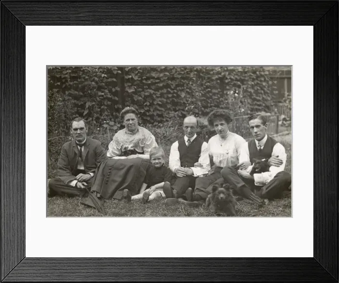 Framed Print : Six people and two dogs in a garden Framed Print : Six people and two dogs in a garden