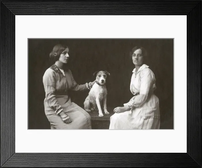 Framed Print : Studio portrait, two women with dog Framed Print : Studio portrait, two women with dog