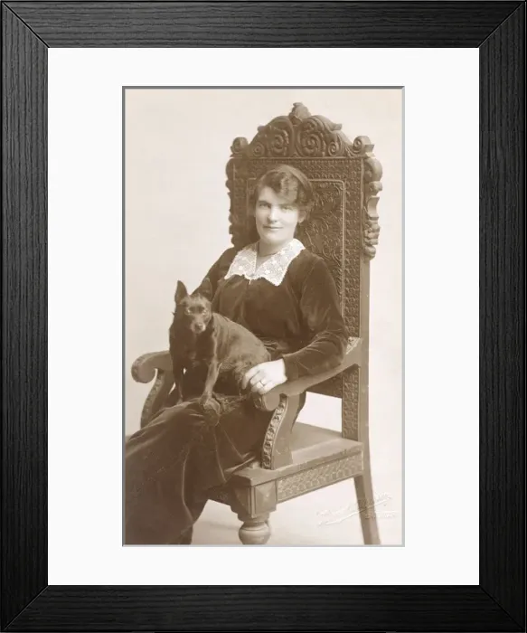 Framed Print : Studio portrait, woman with dog Framed Print : Studio portrait, woman with dog