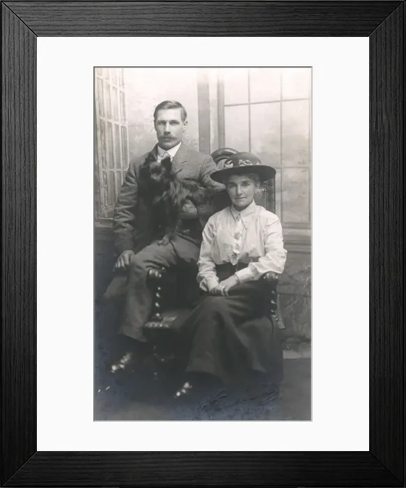 Framed Print : Studio portrait, couple with dog Framed Print : Studio portrait, couple with dog